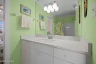 1711 E Fort Macon Road, Atlantic Beach, NC 28512 — 4-bedroom waterfront home in Asbury Beach, Atlantic Beach, NC, photo 24 of 42: Jack n Jill Bath