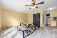 705 Maynard Boulevard, Jacksonville, NC 28546 — 3-bedroom manufactured home in Maynard Manor, Jacksonville, NC, photo 22 of 36: Family Room