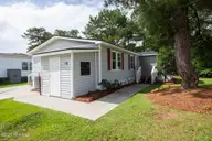 406 Ensign Court, Hampstead, NC 28443 — 3-bedroom manufactured home in Topsail Greens, Hampstead, NC, photo 1 of 35