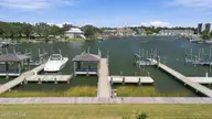 4709 3 S Shore Drive, Morehead City, NC 28557 — waterfront lot in Peltier Point, Morehead City, NC, photo 8 of 12: View of Dock from Shore