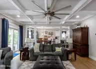 213 Creek View Circle, Sneads Ferry, NC 28460 — 4-bedroom waterfront home in Creeks Edge, Sneads Ferry, NC, photo 7 of 51: c living room 2