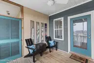 112 Oakleaf Drive 1003-A, Pine Knoll Shores, NC 28512 — 2-bedroom waterfront condo in Shutters OS, Pine Knoll Shores, NC, photo 11 of 58: Front Balcony (b)