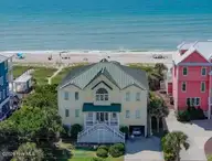 5715 Ocean Drive, Emerald Isle, NC 28594 — 8-bedroom waterfront home in Surf Landing Cove, Emerald Isle, NC, photo 1 of 64: 5715 Ocean crop