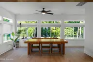 320 Summerhouse Drive, Holly Ridge, NC 28445 — 5-bedroom waterfront home in Summerhouse On Everett Bay, Holly Ridge, NC, photo 14 of 41: sunroom 1