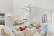 9813 Sandy Court, Emerald Isle, NC 28594 — 4-bedroom waterfront home in Dolphin Ridge, Emerald Isle, NC, photo 24 of 67: 425A6281-livingroom_dining_Final