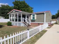 1984 River Street SW, Supply, NC 28462 — 3-bedroom manufactured home in Fishermans Village, Supply, NC, photo 1 of 37: front