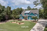 113 Mallard Drive, Hampstead, NC 28443 — 4-bedroom waterfront home in Mallard Bay, Hampstead, NC, photo 1 of 20