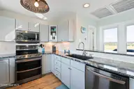 648 Ocean Boulevard W, Holden Beach, NC 28462 — 3-bedroom waterfront home in Bacon Island Harbor, Holden Beach, NC, photo 12 of 65: mls-DSC05393