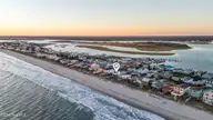 5419 W Beach Drive, Oak Island, NC 28465 — 7-bedroom waterfront home, Oak Island, NC, photo 10 of 69: 109_drone