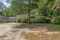 630 Dogwood Drive, Sunset Beach, NC 28468 — 3-bedroom manufactured home in Seaside Station, Sunset Beach, NC, photo 2 of 36: Front view