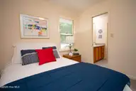 129 Indigo Drive, Emerald Isle, NC 28594 — 3-bedroom home in Bluewater Bay, Emerald Isle, NC, photo 19 of 29: Bedroom 2