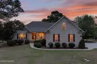 1081 Ridgemont Drive, Leland, NC 28451 — 4-bedroom home in Magnolia Greens, Leland, NC, photo 1 of 63