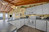 1011 W Beach Drive, Oak Island, NC 28465 — 4-bedroom waterfront home, Oak Island, NC, photo 19 of 68: 27-web-or-mls-IMG_2386