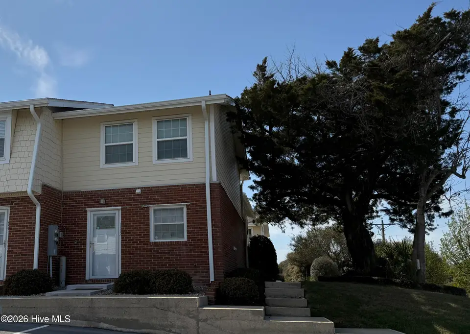 283 Salter Path Road 115, Pine Knoll Shores, NC 28512 — 2-bedroom waterfront condo in Pine Knoll Townes, Pine Knoll Shores, NC, photo 1 of 15: Front View