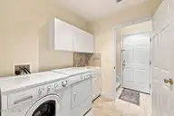 2119 Royal Pines Drive, New Bern, NC 28560 — 3-bedroom waterfront home in Fairfield Harbour, New Bern, NC, photo 24 of 47: Laundry W/Cabinets & Sink
