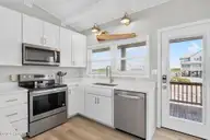 6011 W Beach Drive, Oak Island, NC 28465 — 4-bedroom waterfront home in Long Beach, Oak Island, NC, photo 9 of 68