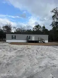 675 Pelican Roost Drive SW, Supply, NC 28462 — 3-bedroom manufactured home in Pelican Roost, Supply, NC, photo 1 of 6: 1_beyc69b1b09068be1