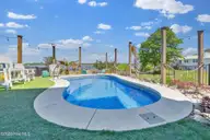 7202 E Yacht Drive, Oak Island, NC 28465 — 3-bedroom waterfront home in Tranquil Harbor, Oak Island, NC, photo 5 of 61: 7202 E Yacht Dr-34