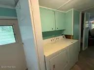 104 River Road, Blounts Creek, NC 27814 — 2-bedroom waterfront manufactured home in Crystal Beach, Blounts Creek, NC, photo 13 of 13: Laundry
