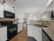 704 Oleander Street, Jacksonville, NC 28540 — 4-bedroom home in Williamsburg Plantation, Jacksonville, NC, photo 10 of 53: 5-web-or-mls-704 Oleander St. 7