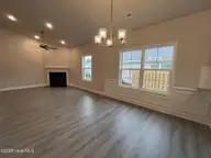 1204 Opaca Drive SE, Bolivia, NC 28422 — 3-bedroom home in Palmetto Creek, Bolivia, NC, photo 10 of 37: living room