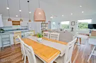 101 Shipwreck Lane E, Emerald Isle, NC 28594 — 3-bedroom waterfront townhome in Spinnakers Reach, Emerald Isle, NC, photo 9 of 38: Dining room