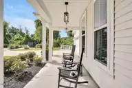 5004 Laurenbridge Lane, Wilmington, NC 28409 — 4-bedroom home in Laurenbridge, Wilmington, NC, photo 5 of 52: DEEP FRONT PORCH