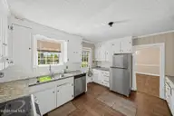 2207 Stallings Drive, Kinston, NC 28504 — 5-bedroom home, Kinston, NC, photo 10 of 29: 13_2207_Stallings_Dr-Kitchen-1056