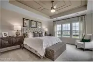 511 Heart Pine Avenue, Wilmington, NC 28411 — 3-bedroom home in Indigo at Abbey Preserve, Wilmington, NC, photo 13 of 27: Primary Bedroom