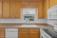 213 Woodland Drive, Wilmington, NC 28403 — 4-bedroom home in Pine Hills, Wilmington, NC, photo 11 of 40: 19_kitchen