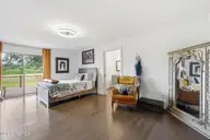 833 Pelican Drive, New Bern, NC 28560 — 3-bedroom waterfront home in Fairfield Harbour, New Bern, NC, photo 17 of 44: Primary Bedroom with Deck Access