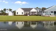 204 Taylorwood Drive, Beaufort, NC 28516 — 3-bedroom waterfront home in Beaufort Club, Beaufort, NC, photo 2 of 53: 204 Taylorwood Revised Back Exterior