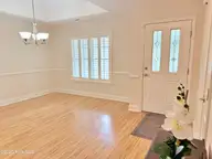 1005 Coral Reef Drive, New Bern, NC 28560 — 3-bedroom home in Fairfield Harbour, New Bern, NC, photo 12 of 53: Foyer and Dining