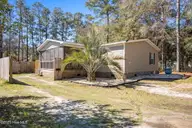 9101 Shady Forest Drive SW, Calabash, NC 28467 — 3-bedroom manufactured home in Shady Forest, Calabash, NC, photo 1 of 61