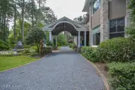 1064 Tresses Court, Vass, NC 28394 — 4-bedroom waterfront home in Woodlake, Vass, NC, photo 4 of 50: Porte-cochere/Driveway