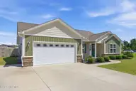 265 Independence Boulevard, Newport, NC 28570 — 3-bedroom home in Heritage Pointe, Newport, NC, photo 3 of 47: garage front