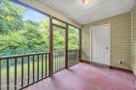 27 E Doris Avenue 403, Jacksonville, NC 28540 — 2-bedroom townhome in Doris Place, Jacksonville, NC, photo 21 of 22: 21_screened porch