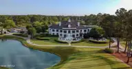 606 Wild Dunes Circle, Wilmington, NC 28411 — 3-bedroom waterfront home in Porters Neck Plantation, Wilmington, NC, photo 9 of 15: hole9