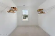 59 S Bandwheel Way, Hampstead, NC 28443 — 4-bedroom home in Sawyers Run, Hampstead, NC, photo 16 of 30: Primary Suite Closet