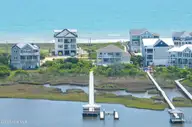 601 New River Inlet Road, North Topsail Beach, NC 28460 — 8-bedroom waterfront home in Sea Dunes Village, North Topsail Beach, NC, photo 9 of 71: 601 New River Inlet Road - Aerial - Edit