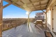 4025 E Beach Drive, Oak Island, NC 28465 — 3-bedroom waterfront home in Long Beach, Oak Island, NC, photo 9 of 40: 41-web-or-mls-CAMMediaLLC.com (41 of 47)