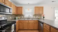 112 Chandler Drive E, Greenville, NC 27834 — 3-bedroom townhome in Karringtyn Crossing, Greenville, NC, photo 7 of 16: Kitchen 2