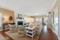 122 Front Street & Slip, Beaufort, NC 28516 — 4-bedroom waterfront home, Beaufort, NC, photo 16 of 63: Open concept living with fireplace
