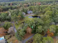 187 69 Clubhouse Drive SW, Supply, NC 28462 — waterfront lot in Lockwood Folly, Supply, NC, photo 5 of 27: DJI_0074_1