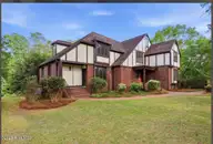 2204 Darien Place NW, Wilson, NC 27896 — 4-bedroom home in Waterford, Wilson, NC, photo 4 of 77: Side View
