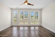 284 Atlantic Court SW, Supply, NC 28462 — 3-bedroom waterfront home in Lockwood Folly, Supply, NC, photo 14 of 47: Sunroom