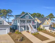 238 Spicer Lake Drive, Holly Ridge, NC 28445 — 4-bedroom waterfront home in Summerhouse On Everett Bay, Holly Ridge, NC, photo 2 of 69: 2_238 spicer lake dr-0002