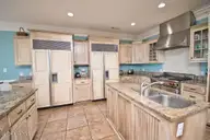 5715 Ocean Drive, Emerald Isle, NC 28594 — 8-bedroom waterfront home in Surf Landing Cove, Emerald Isle, NC, photo 16 of 64: Two Sub Zero refrigerators