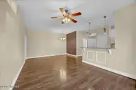 119 Covil Avenue Unit 103, Wilmington, NC 28403 — 2-bedroom condo in Covil Garden Condominiums, Wilmington, NC, photo 8 of 33: Living Room to Dining Room
