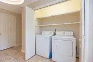 835 Saint Andrews Drive, Pinehurst, NC 28374 — 3-bedroom home in Unit 6, Pinehurst, NC, photo 15 of 37: laundry closet